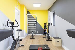 Modern, complete with Office, AC, and Gym
