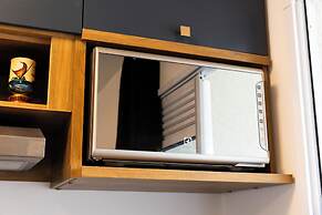 Modern, complete with Office, AC, and Gym