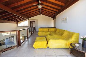 Casa com rea Gourmet e Quintal a 200 m da Praia