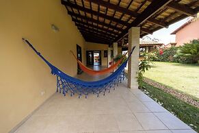 Casa com rea Gourmet e Quintal a 200 m da Praia
