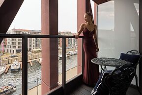 Granaria Premium River View by Downtown Apartments