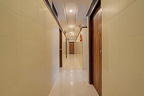 Fabhotel Sapthagiri Suites Inn