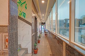 Fabhotel Sapthagiri Suites Inn
