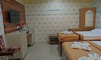 Fabhotel Amutham Residency