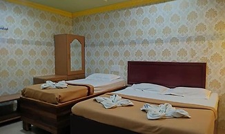 Fabhotel Amutham Residency