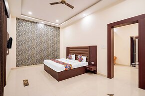 Fabhotel Palm Bliss