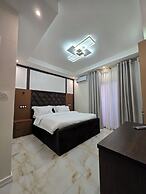 SUNA'A HOME LOGPOM