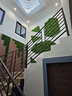 SUNA'A HOME LOGPOM