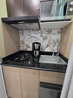 SUNA'A HOME LOGPOM
