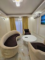 SUNA'A HOME LOGPOM