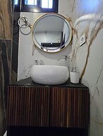 SUNA'A HOME LOGPOM