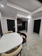 SUNA'A HOME LOGPOM