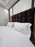 SUNA'A HOME LOGPOM