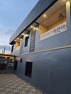 SUNA'A HOME LOGPOM