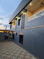 SUNA'A HOME LOGPOM
