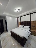 SUNA'A HOME LOGPOM