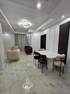 SUNA'A HOME LOGPOM