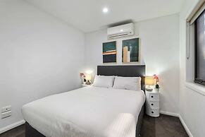 Comfortable 2BR Retreat With Balcony & Parking