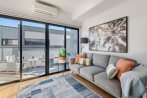 Comfortable 2BR Retreat With Balcony & Parking