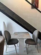 Peravi Suites at Embassy Gardens