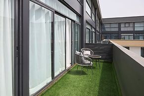 Peravi Suites at Embassy Gardens