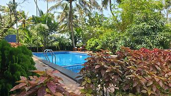 Mango Lantern Villa By Mirth Kollam