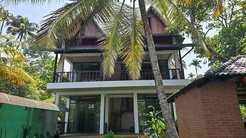 Mango Lantern Villa By Mirth Kollam