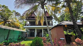 Mango Lantern Villa By Mirth Kollam