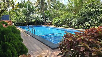 Mango Lantern Villa By Mirth Kollam