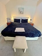 Entire Two Bedroom Detached Coach House
