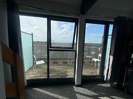 Kick Back Relax Stylish Space With Balcony