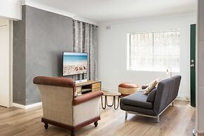 Suburban Two-bed Apartment With Parking and Patio