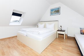 Gemuetliche Ferienwohnung Obergeschoss, Bensersiel