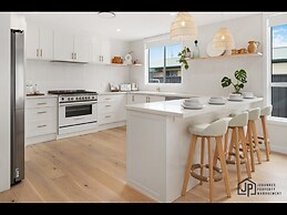 Elegant Beachside Retreat With Luxurious Amenities
