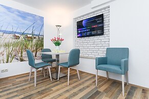Gemuetliche Ferienwohnung mit Wintergarten, Bensersiel