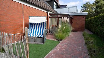 Gemuetliche Ferienwohnung mit Wintergarten, Bensersiel