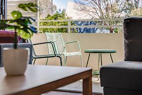 Tranquil Apartment in Green, Well Connected Suburb