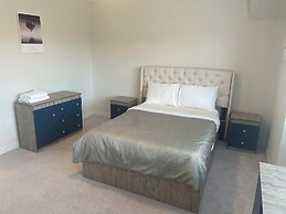 Two Adjacent Homes with 8 Bedrooms