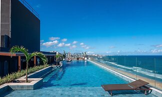 Beachfront Building With Pool and gym - Arus