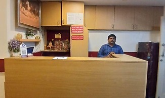 Fabhotel Sri Sai Guru Comforts