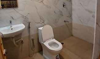Fabhotel Sri Sai Guru Comforts