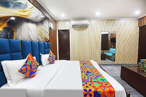 Fabhotel Happy Residency