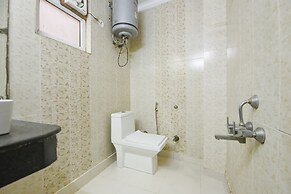 Fabhotel Happy Residency