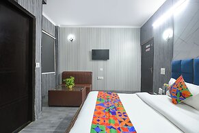 Fabhotel Happy Residency
