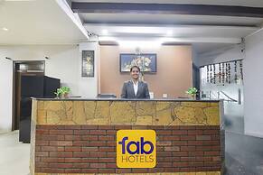Fabhotel Happy Residency