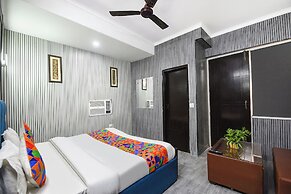 Fabhotel Happy Residency