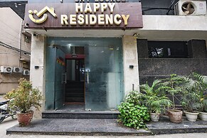 Fabhotel Happy Residency