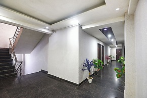 Fabhotel Happy Residency