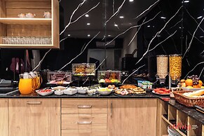 Ta  Guzeppi Boutique Stays by Zzzing