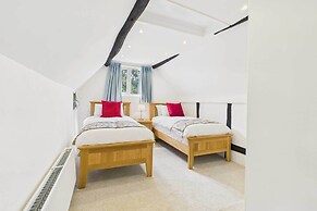 Host Stay Merrow Cottage